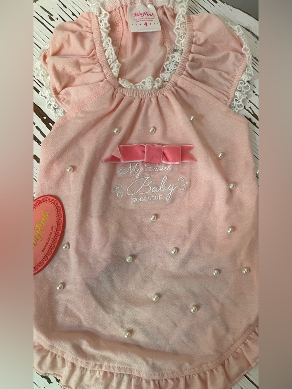 Pink Pearl-Embellished Dress with Bow
Size 4